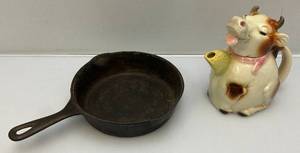 lot 207 image: Vintage Collectible Cow Teapot & No. 5 Cast Iron Pan