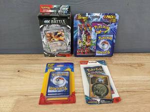 lot 98A image: Brand New Pokemon Trading Cards Including EX Battle Deck, TCG Lightening Set, Pupitar Pack and a 21 Card Pack I