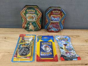 lot 22A image: Brand New Pokemon Trading Cards Including Dragonite Box, Salamence Box, Scarlet & Violet Stellar Crown, Pawmot Pack and a Pack of 21 Cards I