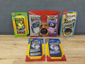 lot 37A image: Brand New Pokemon Trading Cards Including TCG Booster Packs, Pawmot Pack, Mystery Pack and 2 Packs of 21 Cards I