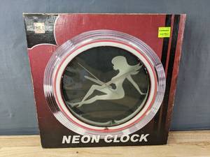 lot 55 image: Womans Silhouette Neon Wall Clock K