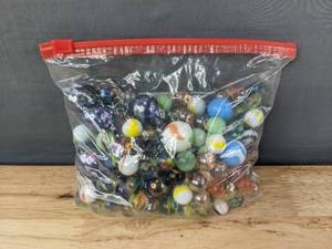 lot 67 image: A Collection of Various Sized Marbles K