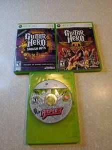 lot 446 image: 3 Total XBOX 360 Guitar Hero Smash Hits Guitar Hero Areosmith AMPED 3 R