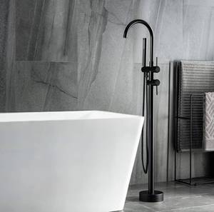 lot 218 image: New TapLong Freestanding Floor Mount Bathtub Faucet Brass Single Handle with Hand Shower High Flow Rate Max 6 GPM Matte Black $139.99 Retail B