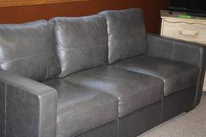 lot A-4 image: Like New Gray Leather Sofa with Contemporary Design
