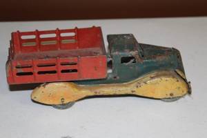lot 28 image: Vintage Tin Toy Truck with Red Cargo Bed