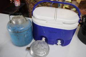 lot 59 image: Vintage Igloo Cooler, Blue Metal Water Jug, and Aluminum Lid
