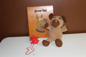 lot A-77 image: Vintage Crocheted Dog Plush Toy, Scooby-Doo Artwork, and Red Toy Plane Collection