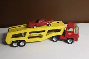 lot 80 image: Vintage Tonka Car Carrier Truck with Red Pickup Truck