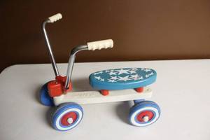 lot 87 image: Vintage Plastic Ride-On Toy Scooter with Stars Decoration
