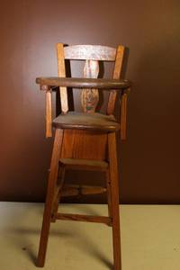 lot 101 image: Vintage Wooden High Chair with Decorative Seat Back