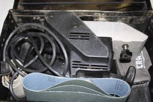 lot 134 image: Used Electric Belt Sander with Accessories