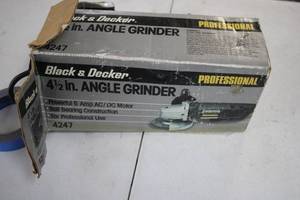 lot A-141 image: Black & Decker 4.5 Angle Grinder Model 4247 with Accessories