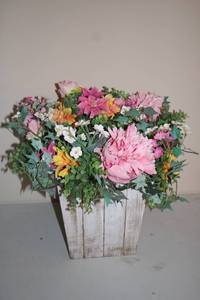 lot 424 image: Vibrant Floral Arrangement in Rustic Wooden Planter