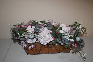 lot 425 image: Artificial Floral Arrangement in Rustic Basket - Decorative Centerpiece