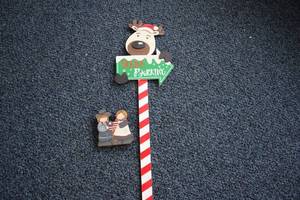 lot 508 image: Holiday Themed Sleigh Parking Sign with Wooden Figurines
