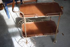 lot 662 image: Vintage Two-Tiered Serving Cart with Decorative Wheels