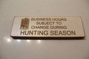 lot 267 image: Wooden Sign - Business Hours Subject to Change During Hunting Season