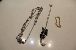 lot 343 image: Collection of 3 Unique Necklaces Including Silver and Gold Chains