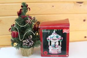 lot 376 image: Dancing Merry Christmas Lighted Figurine with Miniature Christmas Tree
