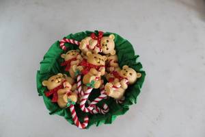 lot 395 image: Set of 8 Holiday Bear Figurines with Green Lined Basket