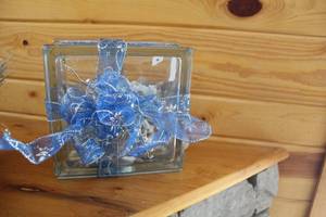 lot 490 image: Decorative Glass Box with LED String Lights and Blue Ribbon