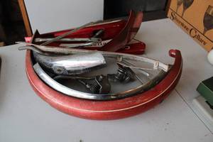 lot 555 image: Lot of Vintage Car Trim and Parts Including Corvair and Roadmaster Pieces