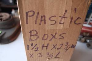 lot 556 image: Set of 12 Clear Plastic Boxes, 1.5 H x 2.75 W x 3.75 L