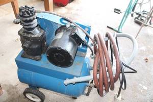lot 576 image: Used Industrial Air Compressor with Motor and Hose