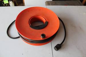 lot 601 image: Cord Wheel with Electrical Extension Cord