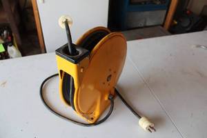 lot 608 image: Heavy-Duty Electric Extension Cord Reel with 50 ft Cable