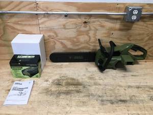 lot 6 image: Green Machine Cordless Chainsaw Model # GMCS6200