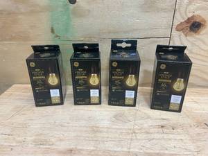 lot 154 image: GE LIGHTING Case of 4- VintaStyle LED Light Bulbs, 5 Watts (60 Watt Equivalent) Warm Candle Light, Amber Glass, Medium Base, Dimmable