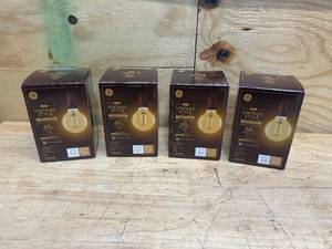 lot 156 image: GE Case of 4- Vintage 60 W Equivalent Dimmable Warm Candle Light G30 Vintage LED Light Fixture Light Bulbs