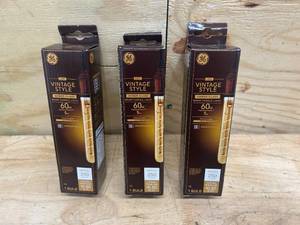 lot 157 image: GE Lot of 3-  Vintage Style LED Tube Light Bulbs, 5 Watts (60 Watt Equivalent) Warm Candle Light, Amber Glass, Medium Base, Dimmable