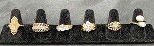 Six Gold Tone Rings