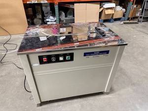 lot 19 image: Uline Poly Strapping Machine - H-959, with extra box of strapping S-5692