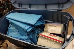 lot 197 image: Bin with Camping Gear -Tarps, Coolers