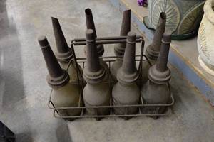 lot 316 image: Antique Oil Bottles with Spouts and Carrier