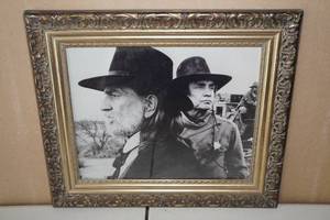lot 50 image: Framed Willie Nelson and Johnny Cash Picture