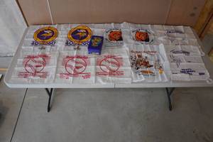 lot 102 image: Assorted Sports Hankies with Camel Tin