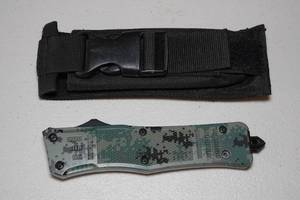 lot 109 image: OTF Pocket Knife with Nylon Sheath