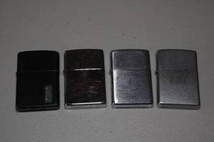 lot 119 image: 4 Zippo Lighters