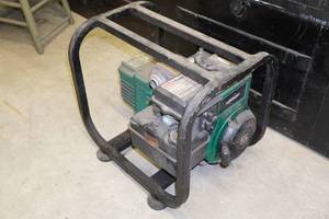 lot 128 image: Coleman Powermate 2250 Watt Gas Generator
