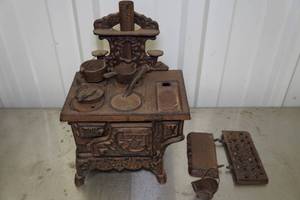 lot 243 image: Crescent Cast Iron Miniature Stove with Accessories