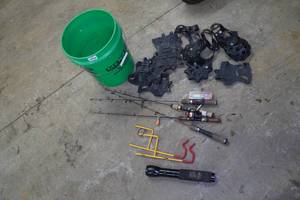 lot 335 image: Assorted Ice Fishing Gear - Rods, Holders, Cleats