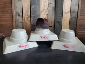 3 Bailey Hat Stands and one Resistol St. Clalir Rovang Fergus Falls Felt Hat with Feather