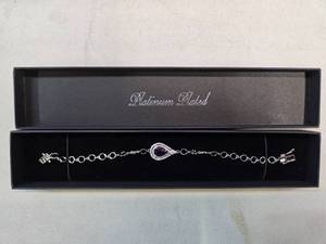 Gold Coast Platinum Plated Bracelet (Purple, New). Sold for over $80.00 online