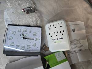 Lot of 2 items 1.  Glow in the dark Analog Clock and 2. Six Outlets, two USB Wall Tap with Nightlight  ( New)