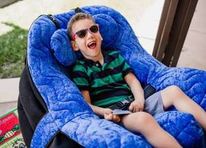 lot 10 image: MSRP $2000 Inspired by Drive P Pod Postural Support Comfort Positioning Chair - Size XL - Has DogCat Hair & Dust From Being On The Ground In The Warehouse Otherwise Great Condition